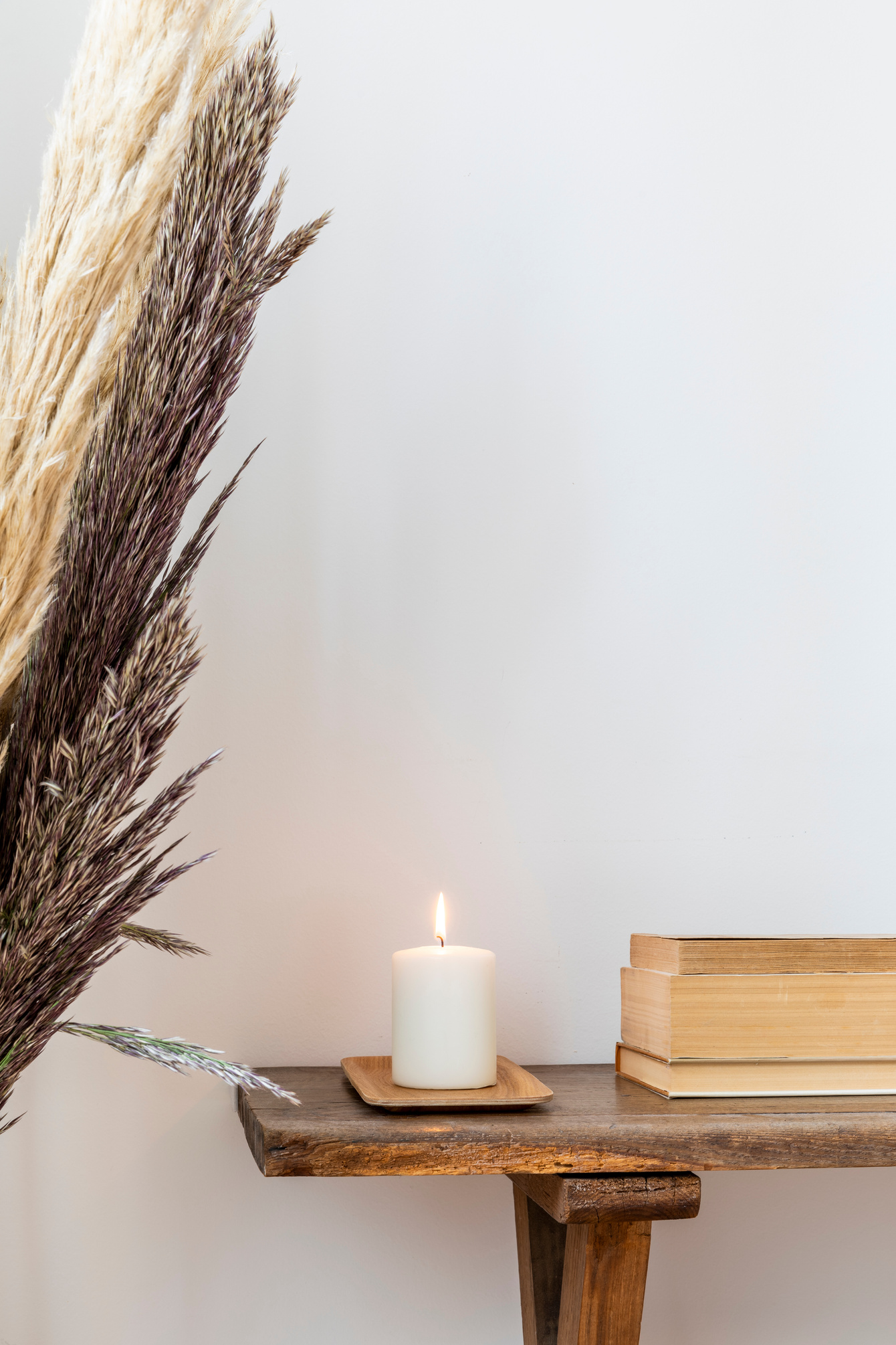 Candle Lighting on Wooden Table